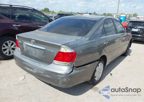 2005 Toyota Camry Le z USA, uszkodzony, nr VIN 4T1BE32K65U611236